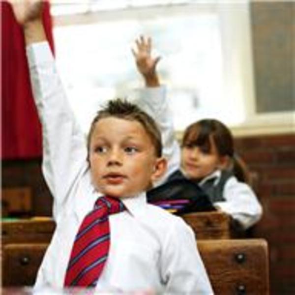 students raising hands