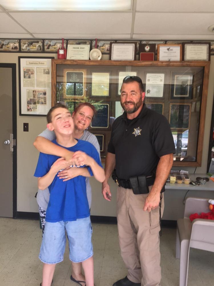 Aiden, his mother, and deputy