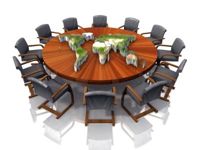 meeting table with outline of the world on the table