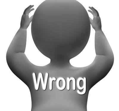 A silhouette of a person with the word Wrong spelled on its back