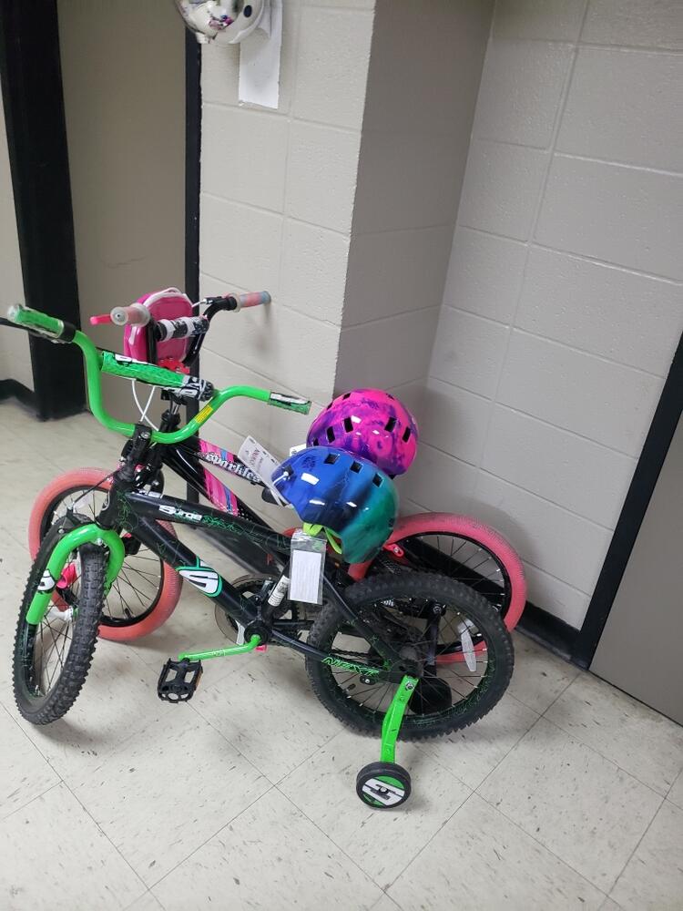 Boy and girls bikes for giveaway to the age groups of 7-8.
