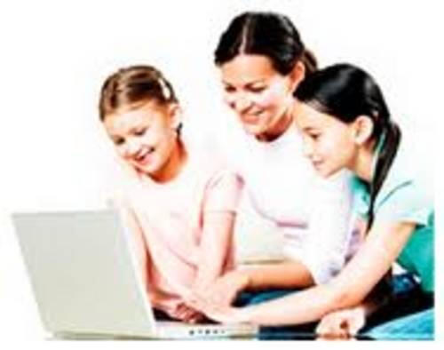 Family with kids at computer